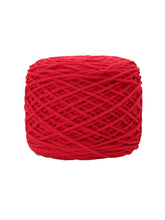 Close-up of red tufting yarn showing texture and true color tone