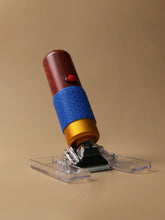 Side-angle view of an electric rug trimmer highlighting its ergonomic handle and adjustable blade design for precise rug trimming.