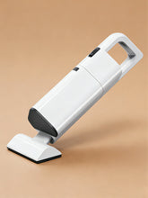 White cordless vacuum cleaner designed for rug tufting, lightweight handheld vacuum for cleaning loose yarn and fiber during tufting process