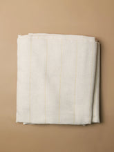 Close-up front view of white primary tufting cloth showing tight, even weave for beginner and professional rug making.