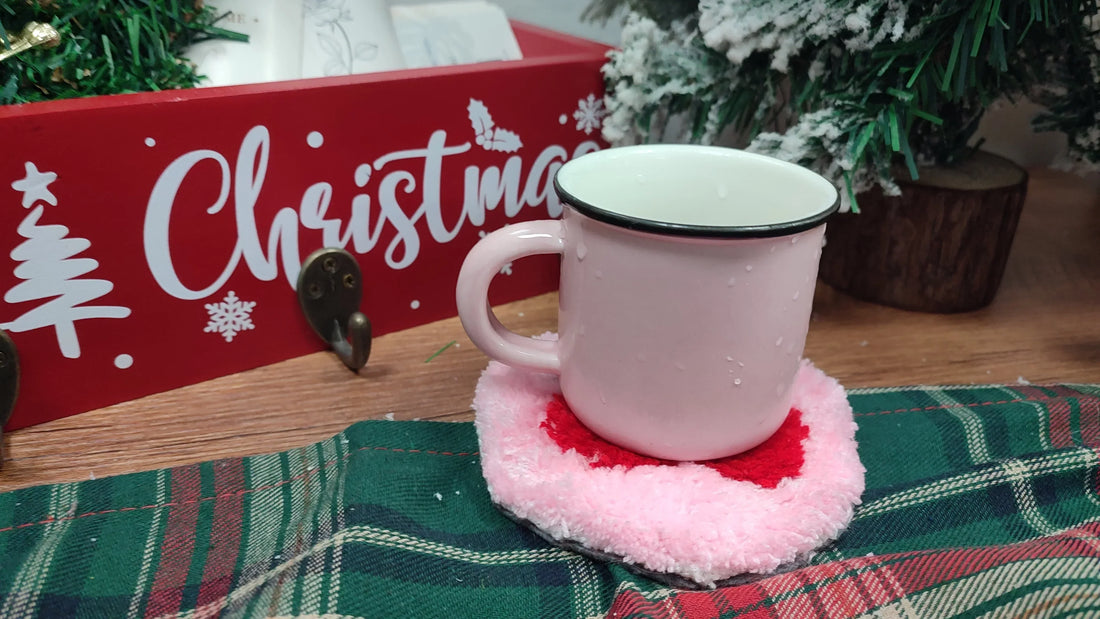 Finished tufted cherry coaster holding a mug in a holiday setting, used as the cover image for Tukloom’s “How to Make a Tufted Coaster” tutorial.