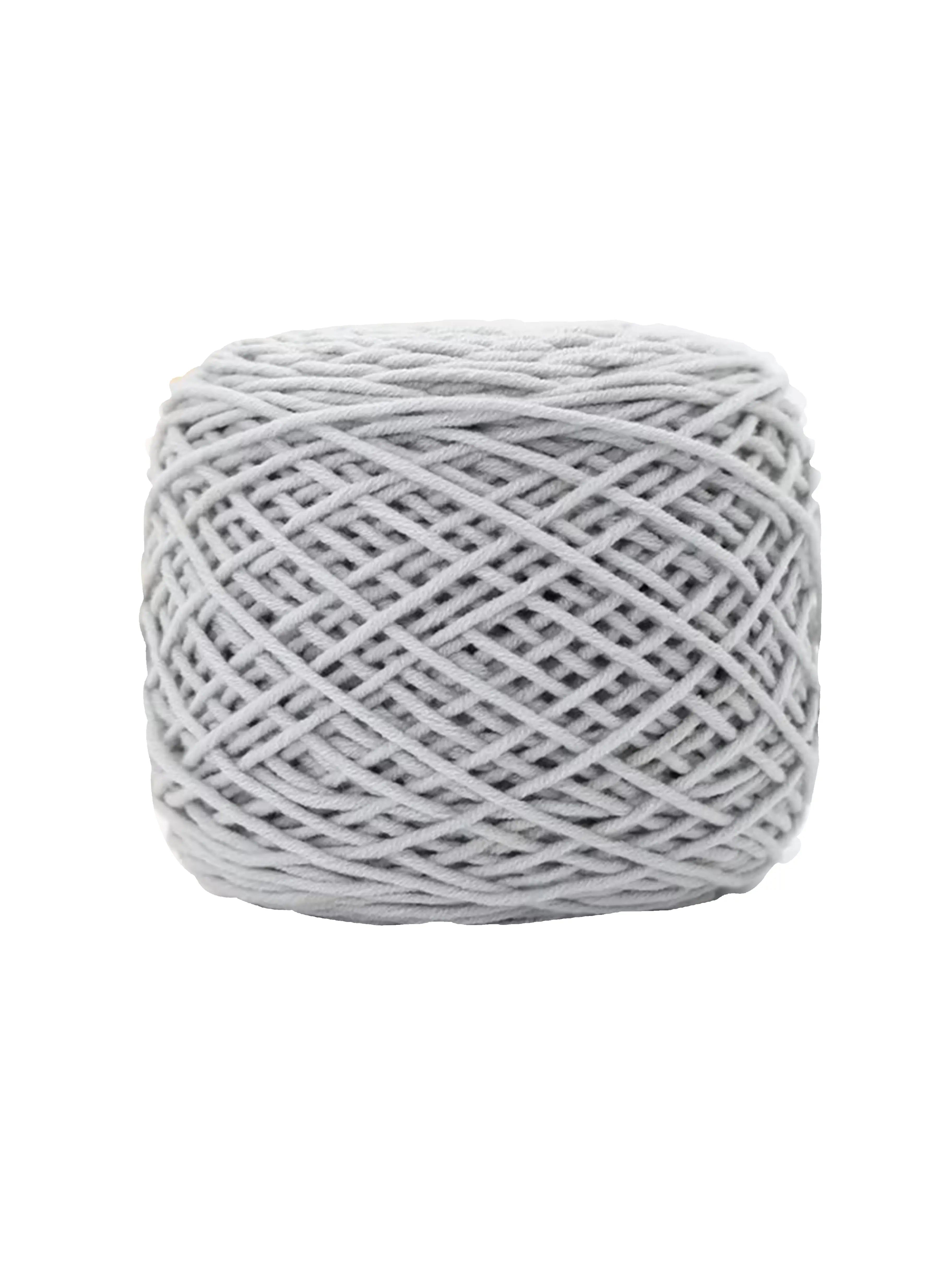 Light grey tufting yarn showing smooth neutral color and fiber texture