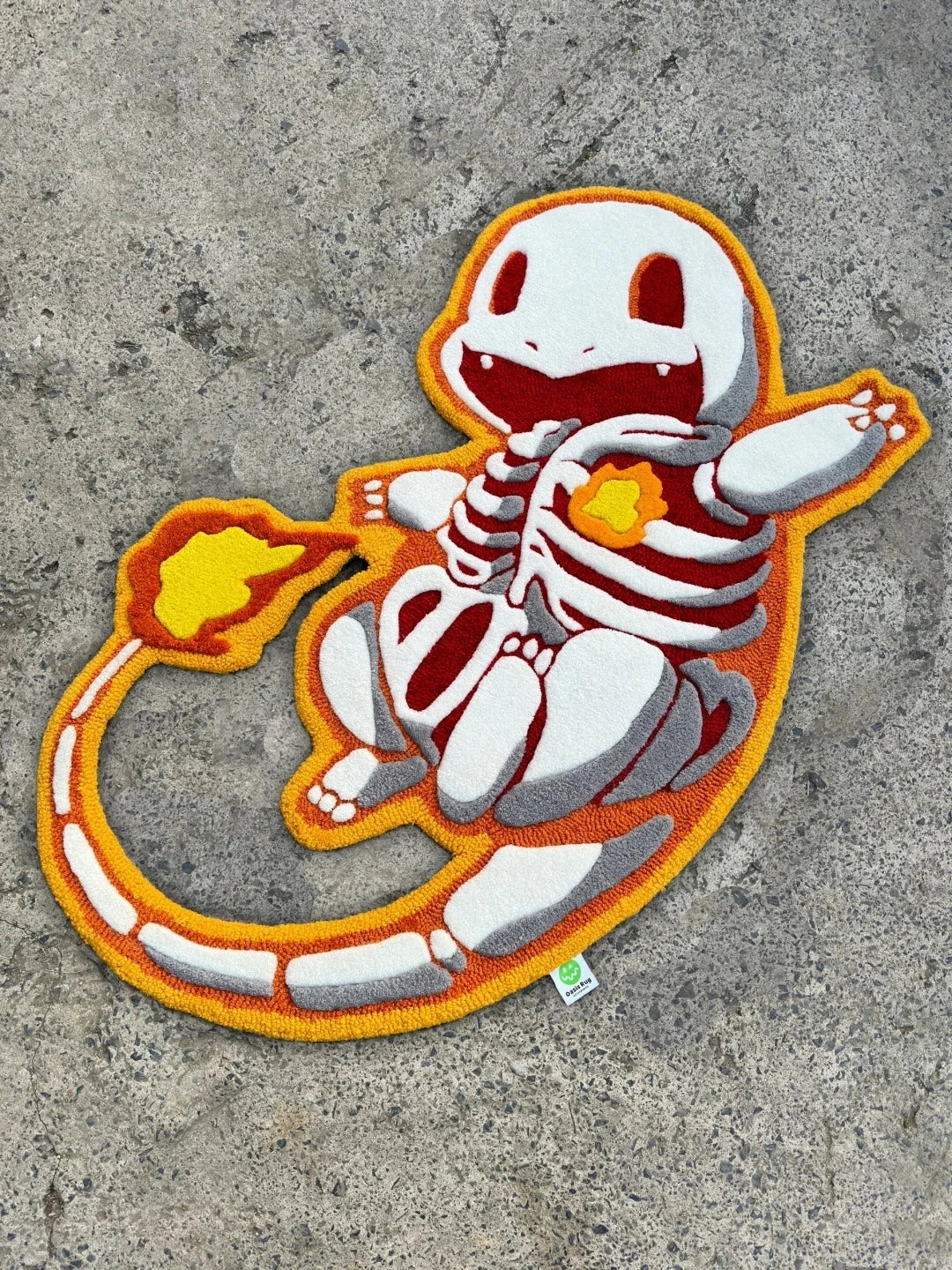 Complete display of the flame-heart lizard tufted rug showing the full character outline, vivid colors, and handmade craftsmanship from edge to edge.